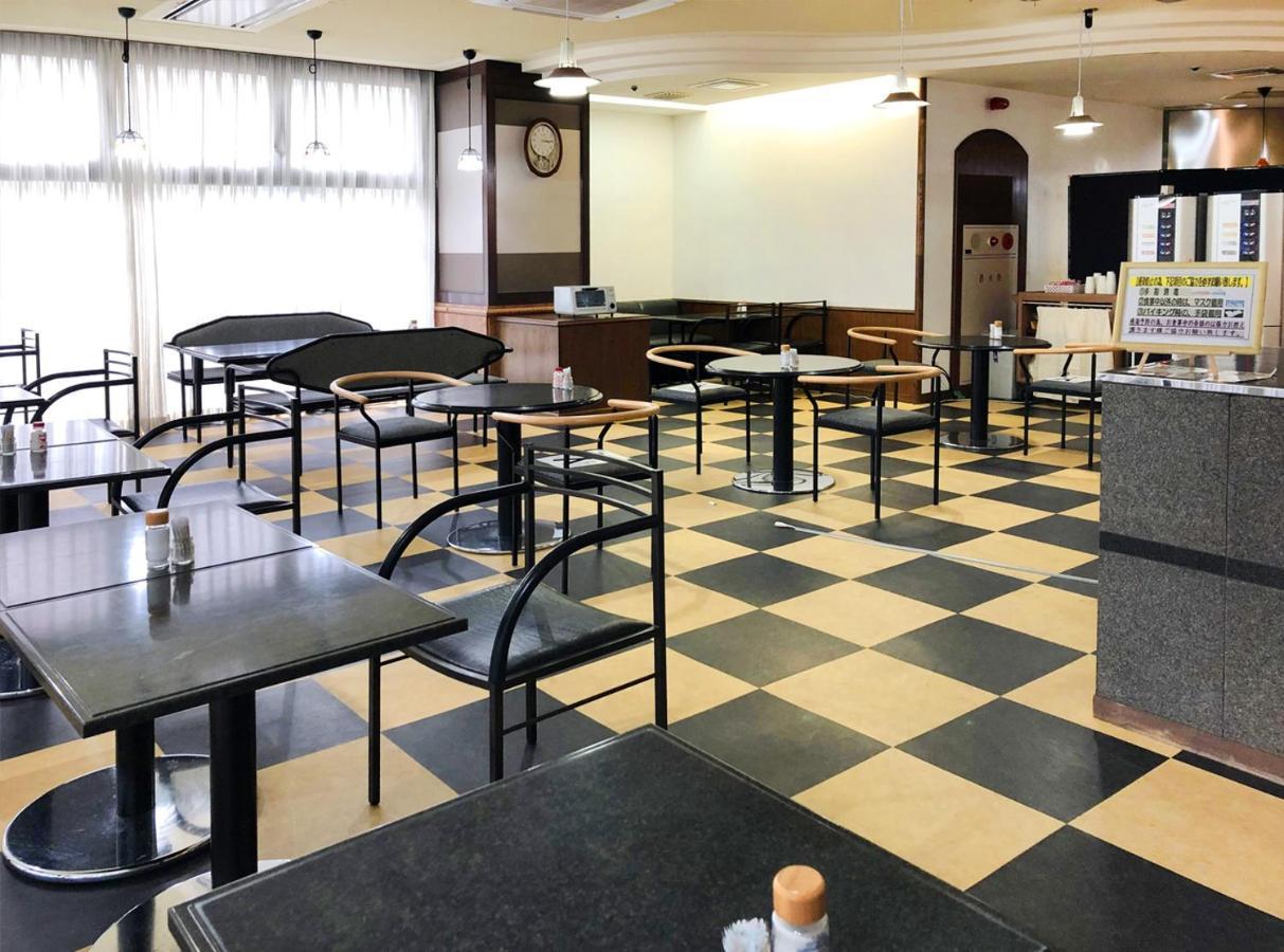 Neyagawa Trend Hotel Bagian luar foto