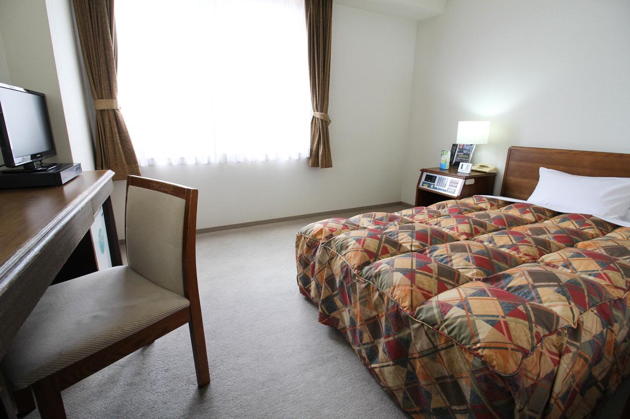 Neyagawa Trend Hotel Bagian luar foto