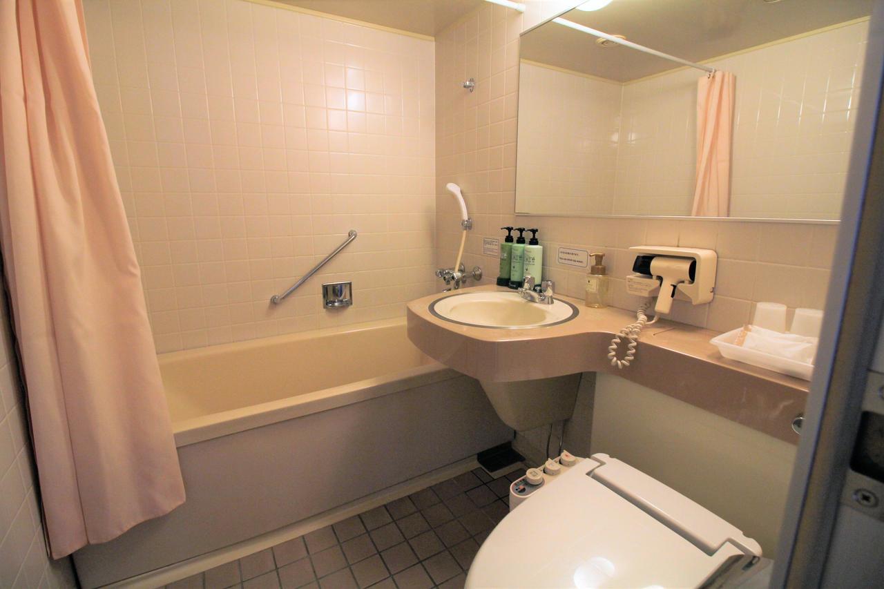 Neyagawa Trend Hotel Bagian luar foto